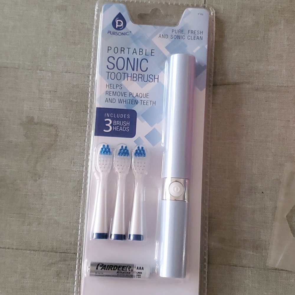 Portable sonic toothbrush in case etc